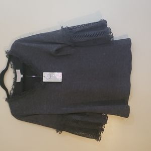 Pretty Angel sweater size L. Small imperfection on back of sweater shown in pic